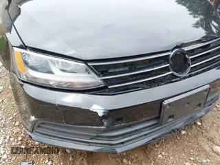 2017 Volkswagen Jetta S z VIN 3VW2B7AJ3HM303198, wystawiony jako IAAI lot #42651056 z przebiegiem 126 253 mil mil oraz . Historia ofert i sprzedaży dostępna na DreamBid. Obrazek 20.
