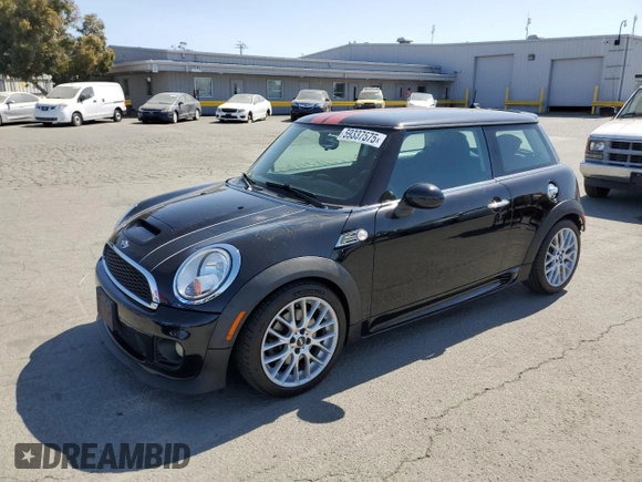 2011 MINI Hardtop S with VIN WMWSV3C57BTY16043, listed as a Copart auction lot 59337575 with 84,617 mi miles and Salvage title. Bid and sale history available at DreamBid. Image 1.