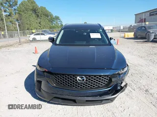 2024 Mazda CX-50 S Premium z VIN 7MMVABDM8RN207182, wystawiony jako IAAI lot #40633600 z przebiegiem 9 011 mil mil oraz . Historia ofert i sprzedaży dostępna na DreamBid. Obrazek 13.