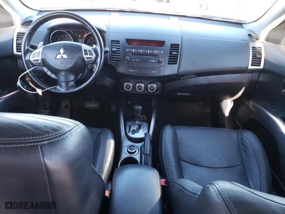 2010 Mitsubishi Outlander XLS with VIN JA4JT4AX7AZ005377, listed as a Copart auction lot 82234564 with 250,831 mi miles and Salvage Title. Bid and sale history available at carsss.com. Image 8.