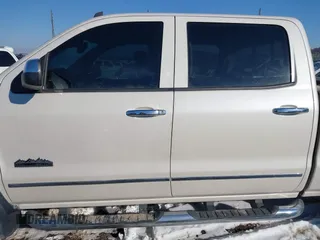 2014 Chevrolet Silverado 1500 High Country with VIN 3GCUKTEC1EG529203, listed as a IAAI auction lot 41643824 with 153,176 mi miles and . Bid and sale history available at DreamBid. Image 15.