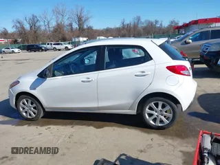 2012 Mazda 2 Touring z VIN JM1DE1LY2C0134281, wystawiony jako IAAI lot #41613690 z przebiegiem 156 546 mil mil oraz . Historia ofert i sprzedaży dostępna na DreamBid. Obrazek 14.