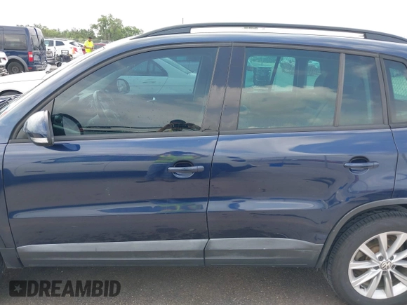 2015 Volkswagen Tiguan SE with VIN WVGAV7AX1FW508313, listed as a IAAI auction lot 42120704 with 136,405 mi miles and . Bid and sale history available at DreamBid. Image 14.