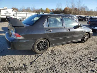 2006 Mitsubishi Lancer OZ-Rally with VIN JA3AJ86E16U059013, listed as a Copart auction lot 80056014 with 107,179 mi miles and Clean Title. Bid and sale history available at carsss.com. Image 3.