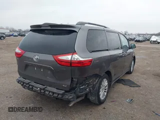 2016 Toyota Sienna XLE with VIN 5TDYK3DC8GS704330, listed as a IAAI auction lot 41586880 with 84,065 mi miles. Bid and sale history available at carsss.com. Image 4.