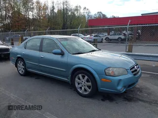 2002 Nissan Maxima GLE z VIN JN1DA31A82T317553, wystawiony jako IAAI lot #40864109 z przebiegiem 270 514 mil mil oraz . Historia ofert i sprzedaży dostępna na DreamBid. Obrazek 1.