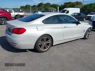 2016 BMW 4 Series 428i with VIN WBA3N7C57GK227468, listed as a IAAI auction lot 41188647 with 81,115 mi miles and . Bid and sale history available at carsss.com. Image 4.