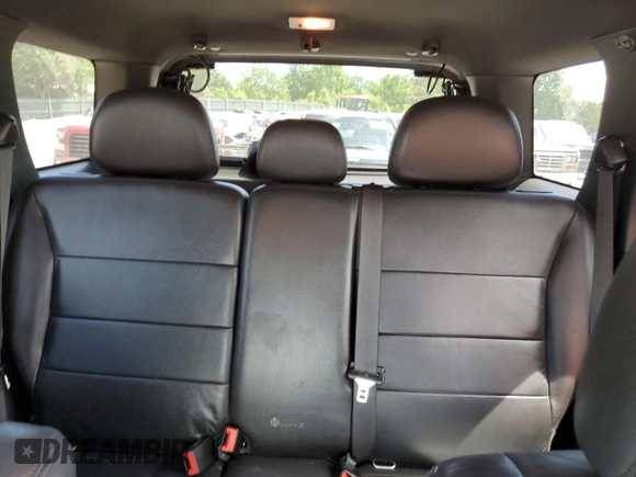 2010 Ford Escape Limited with VIN 1FMCU0E77AKC58458, listed as a Copart auction lot 64207645 with 160,650 mi miles and Salvage title. Bid and sale history available at DreamBid. Image 10.