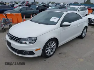 2012 Volkswagen Eos Komfort with VIN WVWBW7AH6CV004193, listed as a IAAI auction lot 42194925 with 71,401 mi miles and . Bid and sale history available at DreamBid. Image 2.