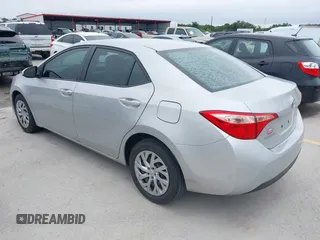 2018 Toyota Corolla L z VIN 5YFBURHE7JP822870, wystawiony jako IAAI lot #42318344 z przebiegiem 118 519 mil mil oraz . Historia ofert i sprzedaży dostępna na DreamBid. Obrazek 3.