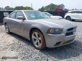 2014 Dodge Charger RT Plus with VIN 2C3CDXCT4EH220586, listed as a IAAI auction lot 42044918 with 199,304 mi miles. Bid and sale history available at carsss.com. Image 1.