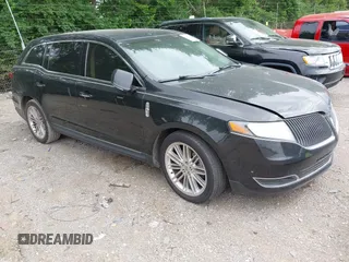 2014 Lincoln MKT EcoBoost z VIN 2LMHJ5AT4EBL54311, wystawiony jako IAAI lot #42346447 z przebiegiem 127 330 mil mil oraz . Historia ofert i sprzedaży dostępna na DreamBid. Obrazek 1.