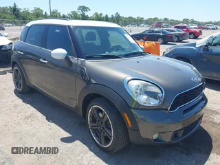 2012 MINI Countryman S z VIN WMWZC3C55CWL83472, wystawiony jako IAAI lot #42289981 z przebiegiem 101 812 mil mil oraz . Historia ofert i sprzedaży dostępna na DreamBid. Obrazek 1.