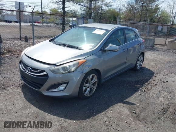 2014 Hyundai Elantra GT with VIN KMHD35LH8EU216052, listed as a IAAI auction lot 42102173 with 112,129 mi miles. Bid and sale history available at carsss.com. Image 2.