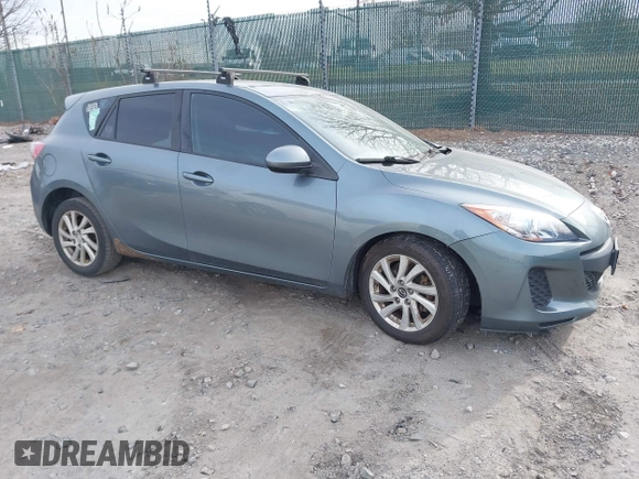 2012 Mazda Mazda3 i Touring with VIN JM1BL1L81C1651952, listed as a IAAI auction lot 40863599 with 242,296 mi miles. Bid and sale history available at carsss.com. Image 1.