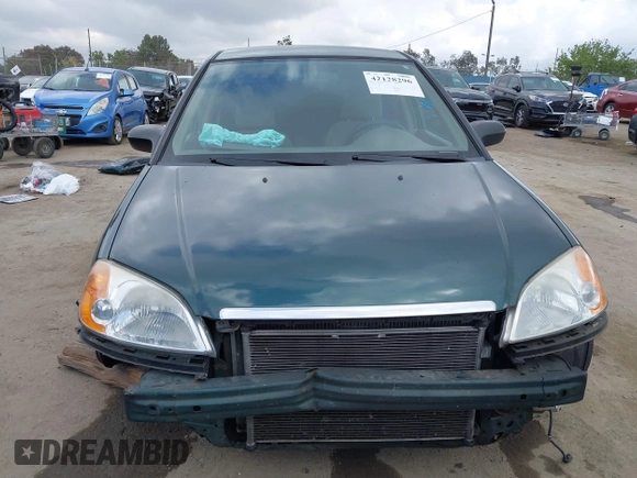 2001 Honda Civic LX with VIN JHMES16571S002955, listed as a IAAI auction lot 42128296 with 223,009 mi miles and . Bid and sale history available at DreamBid. Image 13.