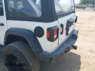 2018 Jeep Wrangler Unlimited Sport S with VIN 1C4HJXDG7JW150038, listed as a IAAI auction lot 42519194 with 113,300 mi miles and . Bid and sale history available at DreamBid. Image 6.