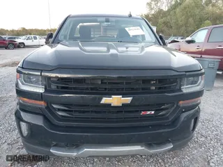 2018 Chevrolet Silverado 1500 LT with VIN 1GCVKREH9JZ115468, listed as a IAAI auction lot 40924644 with 213,059 mi miles. Bid and sale history available at carsss.com. Image 12.