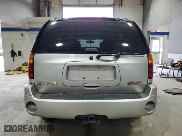 2005 GMC Envoy SLT with VIN 1GKDT13S652197929, listed as a Copart auction lot 42104855 with 228,515 mi miles and Salvage Title. Bid and sale history available at carsss.com. Image 6.