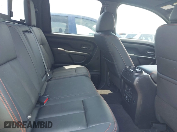 2024 Nissan Titan Pro-4X with VIN 1N6AA1ED8RN114313, listed as a IAAI auction lot 42498591 with 21,955 mi miles and . Bid and sale history available at DreamBid. Image 8.