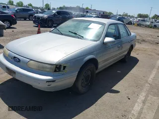 1994 Ford Taurus GL z VIN 1FALP5242RG144553, wystawiony jako IAAI lot #42084759 z przebiegiem 45 059 mil mil oraz . Historia ofert i sprzedaży dostępna na DreamBid. Obrazek 2.