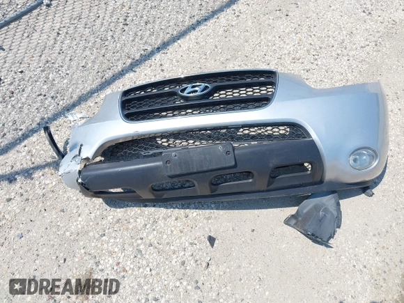 2009 Hyundai Santa Fe SE with VIN 5NMSH73E69H233055, listed as a IAAI auction lot 42454100 with 209,036 mi miles and . Bid and sale history available at DreamBid. Image 12.
