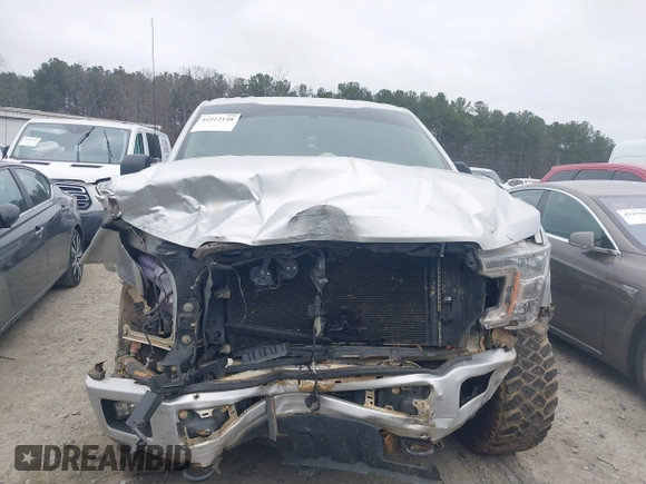 2018 Ford F-150 XL with VIN 1FTMF1EP2JFA46360, listed as a IAAI auction lot 41512148 with 107,667 mi miles. Bid and sale history available at carsss.com. Image 12.