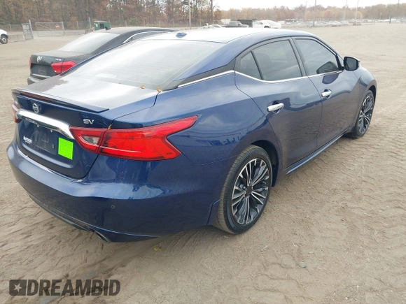2016 Nissan Maxima Platinum z VIN 1N4AA6AP4GC414364, wystawiony jako IAAI lot #40738491 z przebiegiem 97 889 mil mil oraz . Historia ofert i sprzedaży dostępna na DreamBid. Obrazek 4.