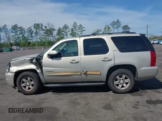 2010 GMC Yukon SLT with VIN 1GKMCCE3XAR225380, listed as a IAAI auction lot 41904723 with 173,686 mi miles. Bid and sale history available at carsss.com. Image 14.