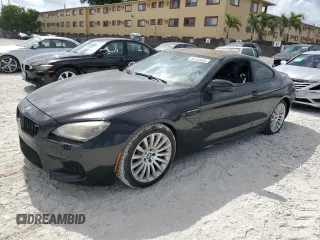 2014 BMW M6 z VIN WBSLX9C59ED160536, wystawiony jako Copart lot #55142095 z przebiegiem 78 550 mil mil oraz Tytuł czysty. Historia ofert i sprzedaży dostępna na DreamBid. Obrazek 1.