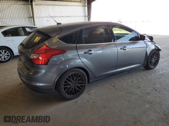2014 Ford Focus Titanium with VIN 1FADP3N29EL382646, listed as a Copart auction lot 60757385 with 123,447 mi miles and Non repairable. Bid and sale history available at DreamBid. Image 3.