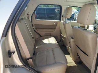 2010 Ford Escape Limited z VIN 1FMCU9EG5AKC49732, wystawiony jako Copart lot #61172415 z przebiegiem 148 796 mil mil oraz Szkoda całkowita • Salvage title. Historia ofert i sprzedaży dostępna na DreamBid. Obrazek 11.