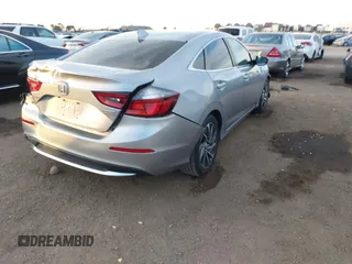 2021 Honda Insight Touring with VIN 19XZE4F99ME009749, listed as a IAAI auction lot 41411868 with 54,808 mi miles and . Bid and sale history available at carsss.com. Image 4.