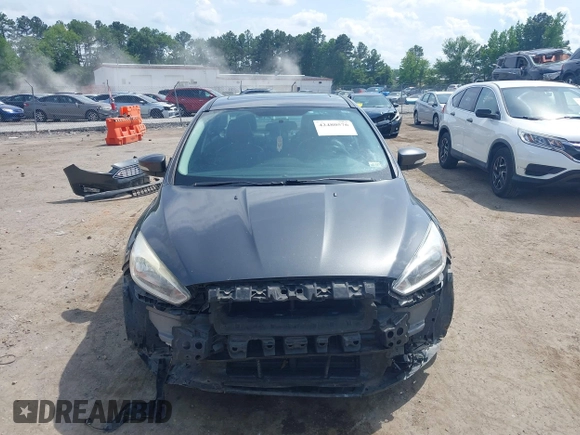 2017 Ford Focus Titanium with VIN 1FADP3J27HL306546, listed as a IAAI auction lot 42480576 with 114,285 mi miles and . Bid and sale history available at DreamBid. Image 13.