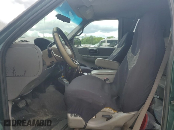 1999 Ford F-150 with VIN 1FTRX18W8XNB82710, listed as a Copart auction lot 58264745 with Not provided miles and Salvage title. Bid and sale history available at DreamBid. Image 7.