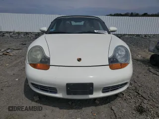 2000 Porsche Boxster z VIN WP0CA2983YU620313, wystawiony jako Copart lot #54605995 z przebiegiem 134 807 mil mil oraz Tytuł czysty. Historia ofert i sprzedaży dostępna na DreamBid. Obrazek 5.