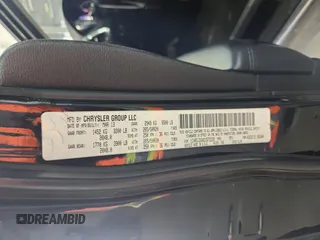 2013 Dodge Durango Crew z VIN 1C4RDJDGXDC672239, wystawiony jako Copart lot #59227905 z przebiegiem 167 982 mil mil oraz Szkoda całkowita • Salvage title. Historia ofert i sprzedaży dostępna na DreamBid. Obrazek 14.