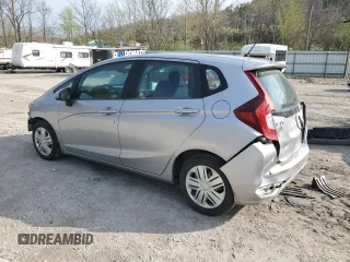 2019 Honda Fit LX z VIN 3HGGK5H41KM712693, wystawiony jako Copart lot #52069275 z przebiegiem 68 522 mil mil oraz Szkoda całkowita • Salvage title. Historia ofert i sprzedaży dostępna na DreamBid. Obrazek 2.