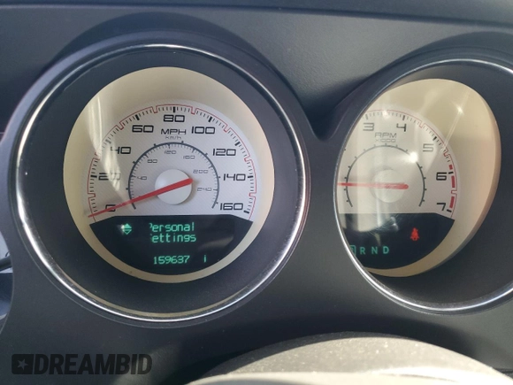 2014 Dodge Challenger R/T z VIN 2C3CDYBT2EH101684, wystawiony jako Copart lot #53581785 z przebiegiem 159 637 mil mil oraz Szkoda całkowita • Salvage title. Historia ofert i sprzedaży dostępna na DreamBid. Obrazek 9.
