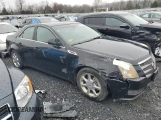 2009 Cadillac CTS AWD with VIN 1G6DS57V890167054, listed as a Copart auction lot 51632805 with 114,968 mi miles and Salvage Title. Bid and sale history available at DreamBid. Image 4.