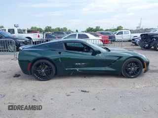 2014 Chevrolet Corvette Z51 2LT z VIN 1G1YK2D75E5104938, wystawiony jako IAAI lot #42168651 z przebiegiem 152 471 mil mil oraz . Historia ofert i sprzedaży dostępna na DreamBid. Obrazek 13.