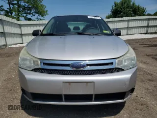 2009 Ford Focus SE z VIN 1FAHP35N99W210276, wystawiony jako Copart lot #59235675 z przebiegiem 143 828 mil mil oraz Czysty tytuł • Clean title. Historia ofert i sprzedaży dostępna na DreamBid. Obrazek 5.