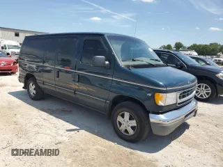 1998 Ford Econoline Passenger XL with VIN 1FMRE11L0WHA00514, listed as a Copart auction lot 64441065 with 111,243 mi miles and Salvage title. Bid and sale history available at DreamBid. Image 4.