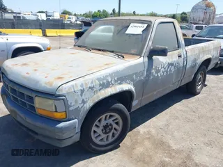 1992 Dodge Dakota S with VIN 1B7FL26X5NS691362, listed as a IAAI auction lot 42001454 with 161,181 mi miles and . Bid and sale history available at carsss.com. Image 2.