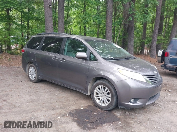 2011 Toyota Sienna XLE AAS with VIN 5TDYK3DC8BS016319, listed as a IAAI auction lot 42186294 with 293,401 mi miles and . Bid and sale history available at DreamBid. Image 1.