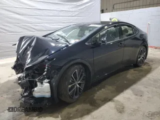 2024 Toyota Prius LE z VIN JTDADABU0R3011932, wystawiony jako Copart lot #52432155 z przebiegiem Nie podano mil oraz Szkoda całkowita • Salvage title. Historia ofert i sprzedaży dostępna na DreamBid. Obrazek 1.