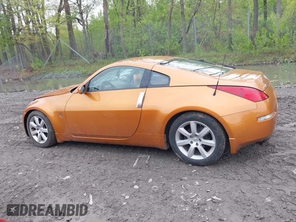 2003 Nissan 350Z Touring z VIN JN1AZ34E73T003839, wystawiony jako IAAI lot #42206083 z przebiegiem 50 919 mil mil oraz . Historia ofert i sprzedaży dostępna na DreamBid. Obrazek 14.
