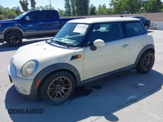2010 MINI Hardtop with VIN WMWMF3C51ATZ62765, listed as a IAAI auction lot 42314250 with 168,345 mi miles and . Bid and sale history available at DreamBid. Image 2.