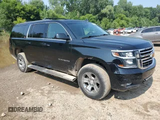2015 Chevrolet Suburban LT with VIN 1GNSKJKC8FR551790, listed as a Copart auction lot 64694485 with 187,367 mi miles and Clean title. Bid and sale history available at DreamBid. Image 4.