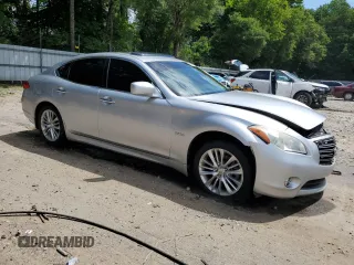 2012 Infiniti M Hybrid with VIN JN1EY1AP0CM910697, listed as a Copart auction lot 60821335 with 145,533 mi miles and Salvage title. Bid and sale history available at DreamBid. Image 4.